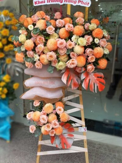 Kệ hoa khai trương giá vẽ hiện đại tone cam